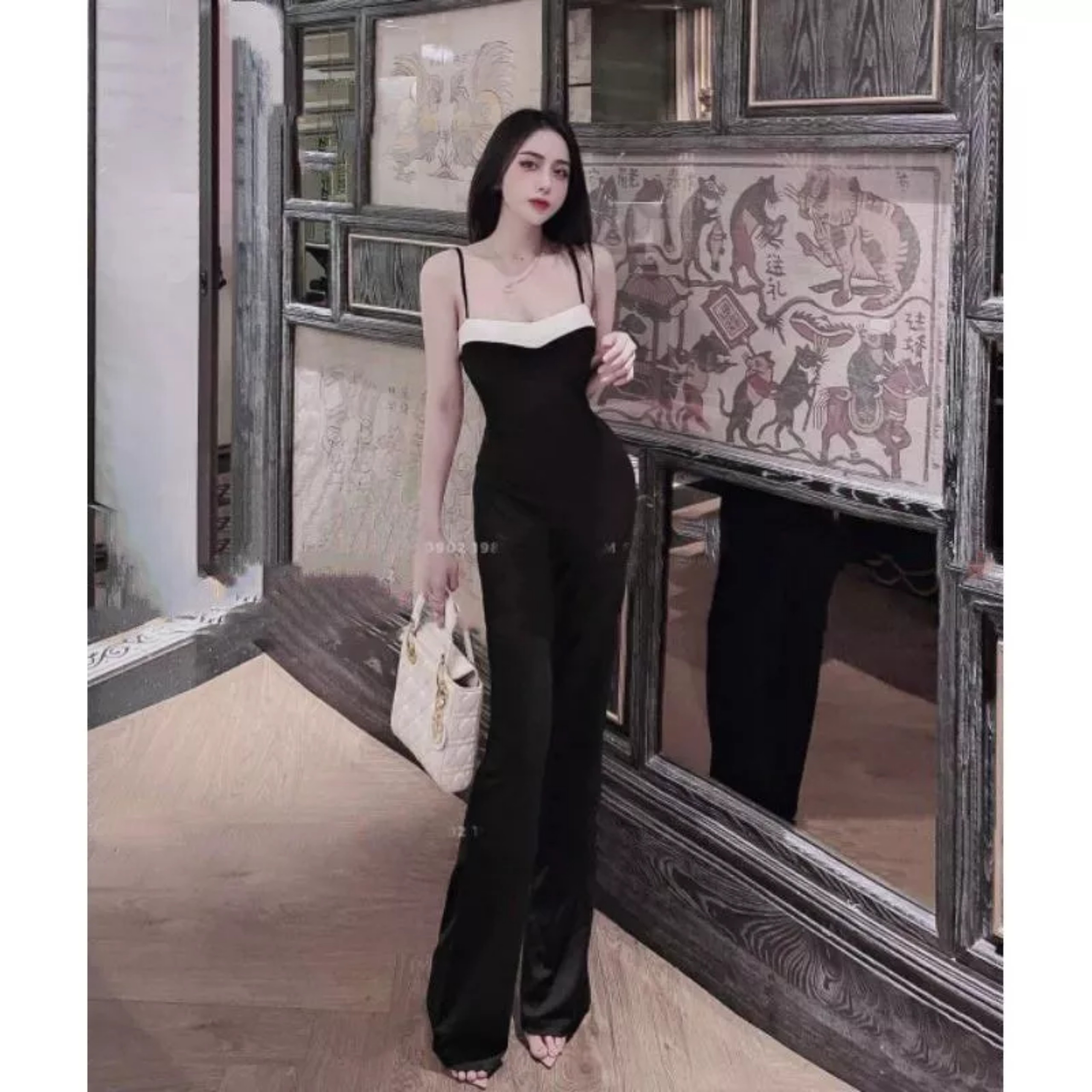 Jumpsuit ống loe 2 dây cúp ngực viền trắng đen