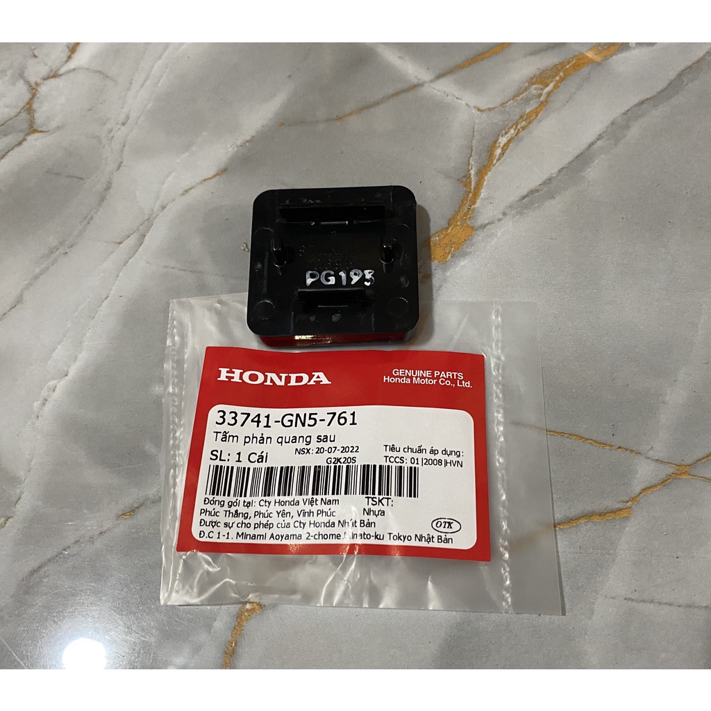 33741gn5761 tấm phản quang sau dream honda.
