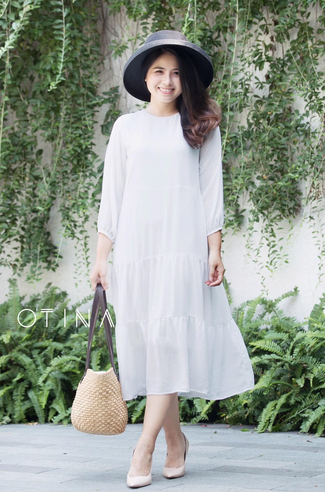 Đầm trắng tay dài babydoll