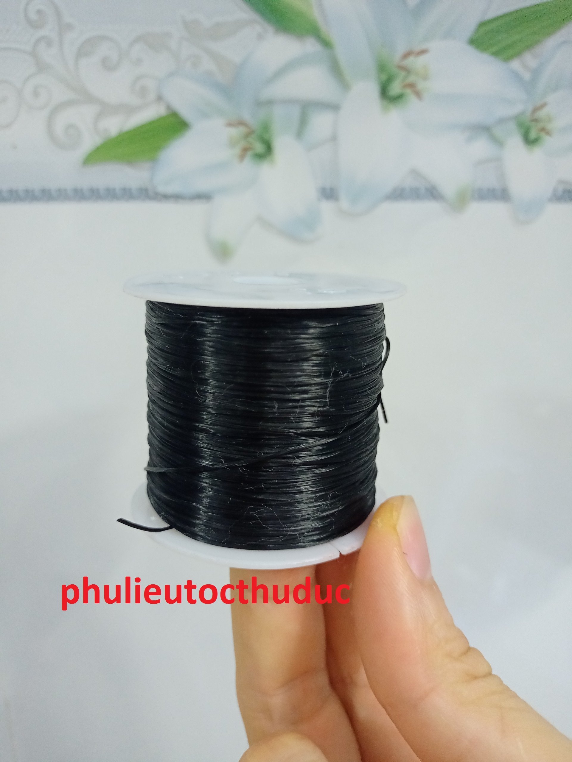 Chỉ cuộn dùng để nối tóc