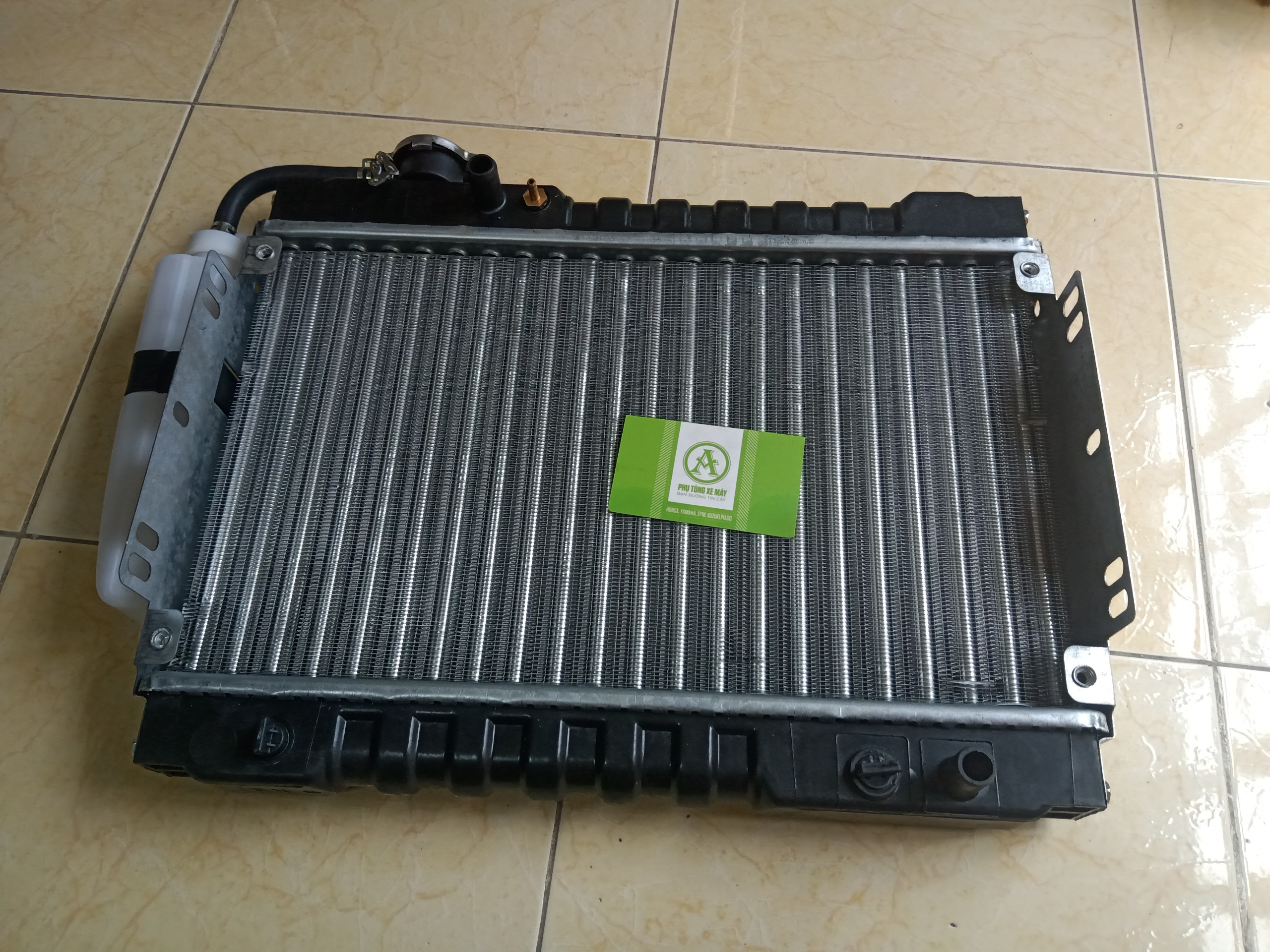 KÉT NƯỚC XE BA BÁNH