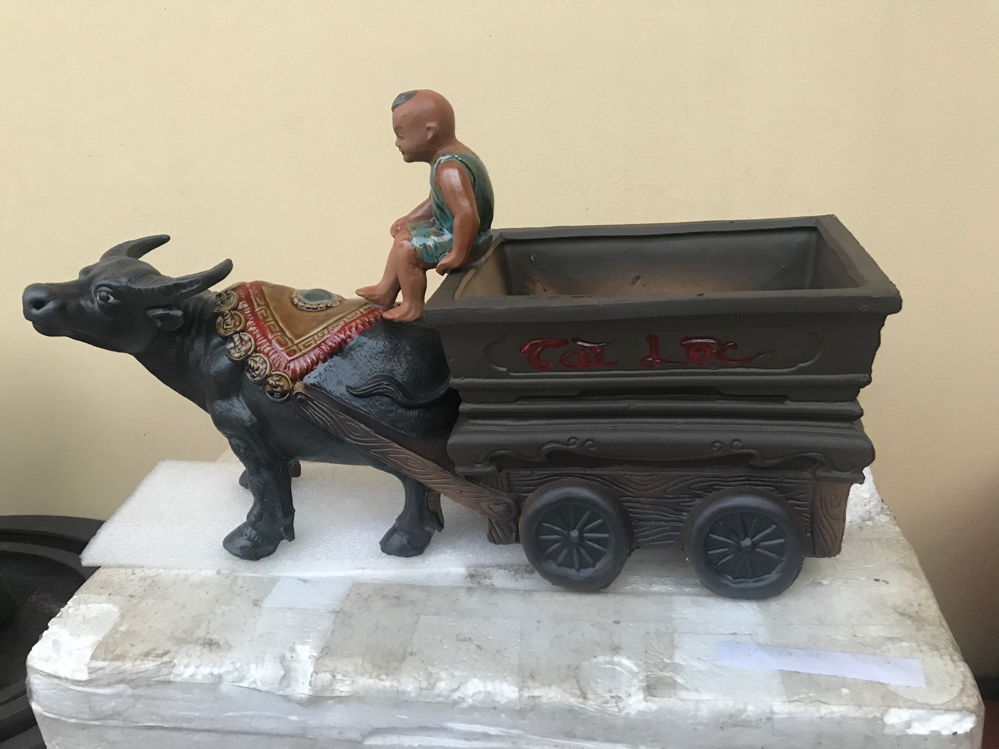 Em bé chăn trâu kéo Tài Lộc