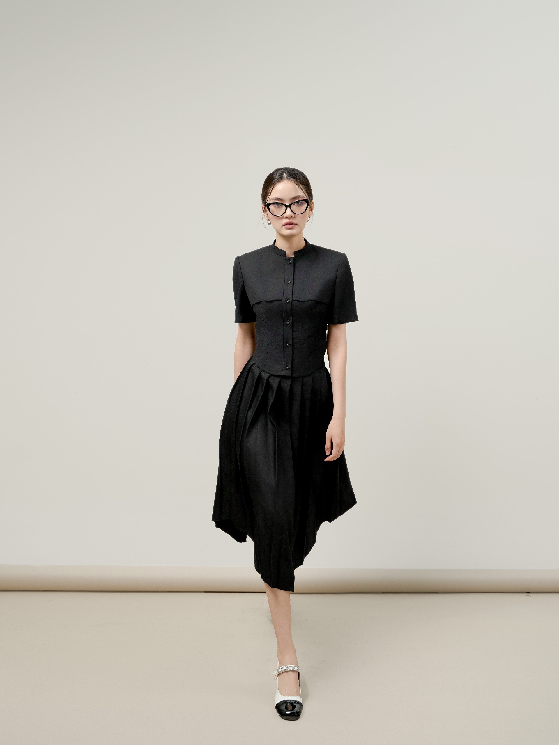 D.CHIC Chân váy xếp ly gấu chéo cạp rời MS: 382875