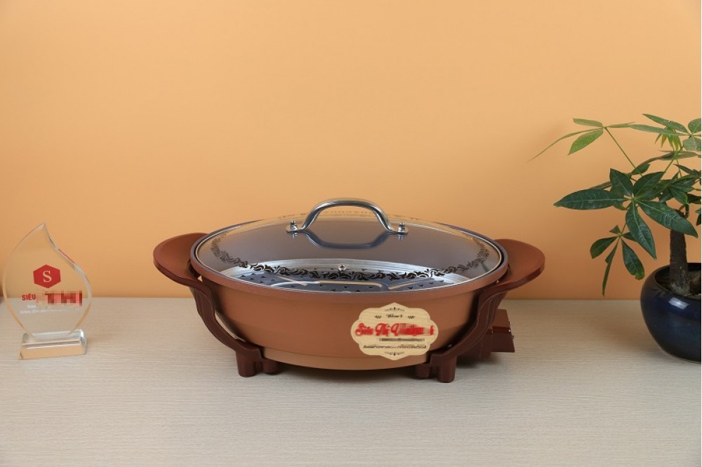 Nồi lẩu điện cá Hàn Quốc đa năng hình bầu dục tặng kèm vỉ hấp tiện dụng