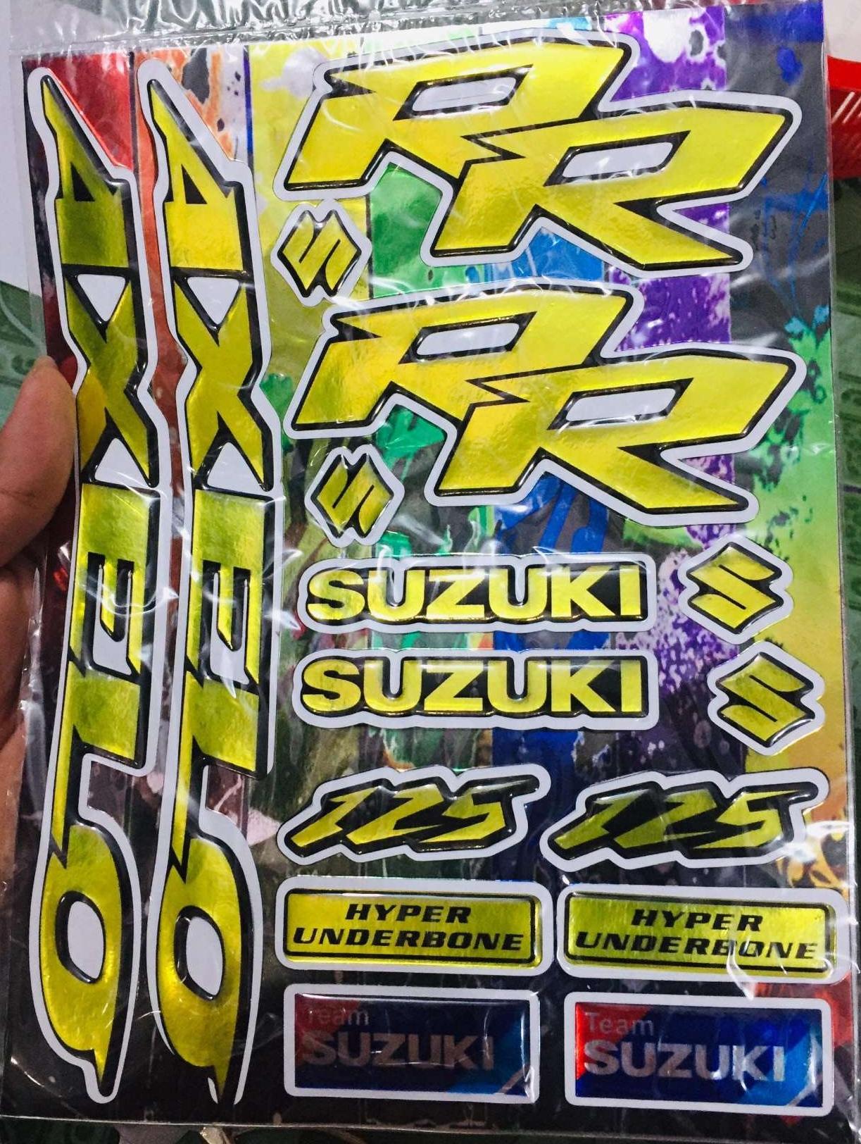 Tem logo Axelo 125 keo nổi Crom vàng