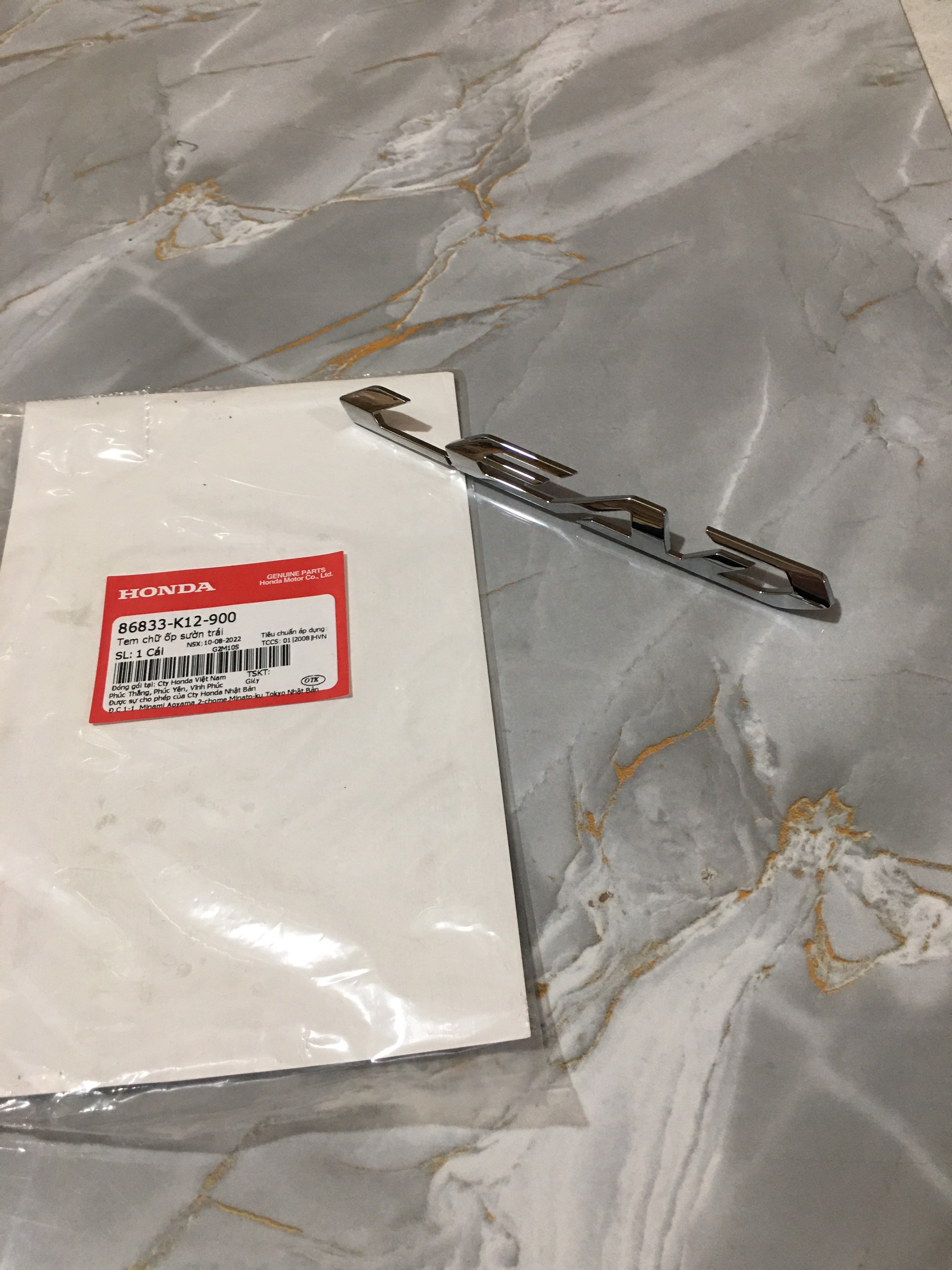 Tem chữ ốp sườn trái Lead 2013-2015 (86833K12900)