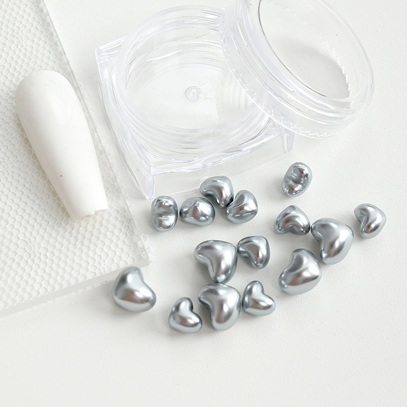 Charm trái tim ngọc trai nổi trang trí móng (hũ)