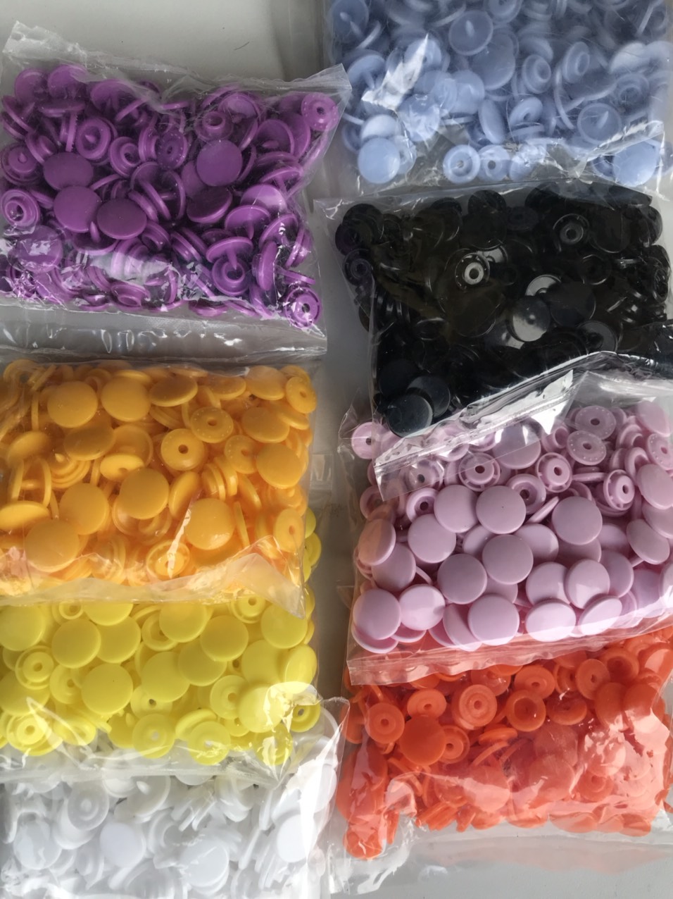 Nút bấm nhựa 4 thành phần 12mm bịch 50 nut