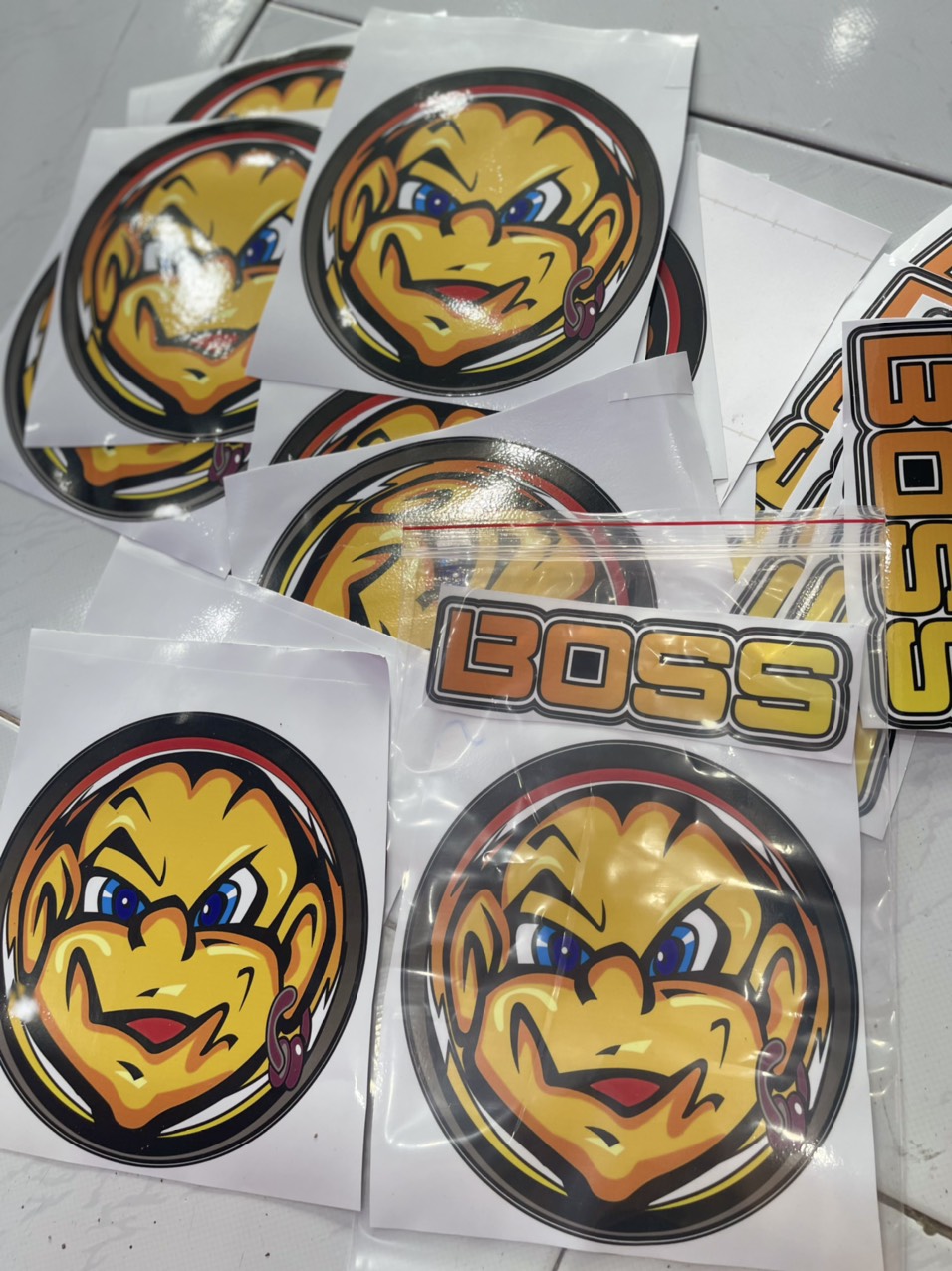 Tem mặt trời boss dán phía sau xe may