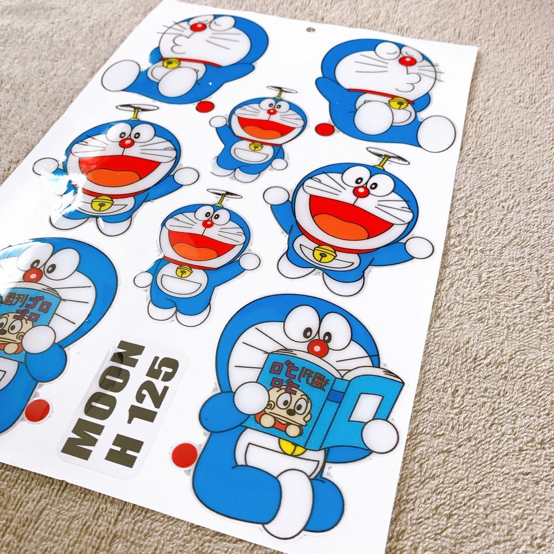 [HCM]TEM NỔI ĐỔ KEO DOREMON ĐỌC SÁCH TRANG TRÍ XE CAO CẤP