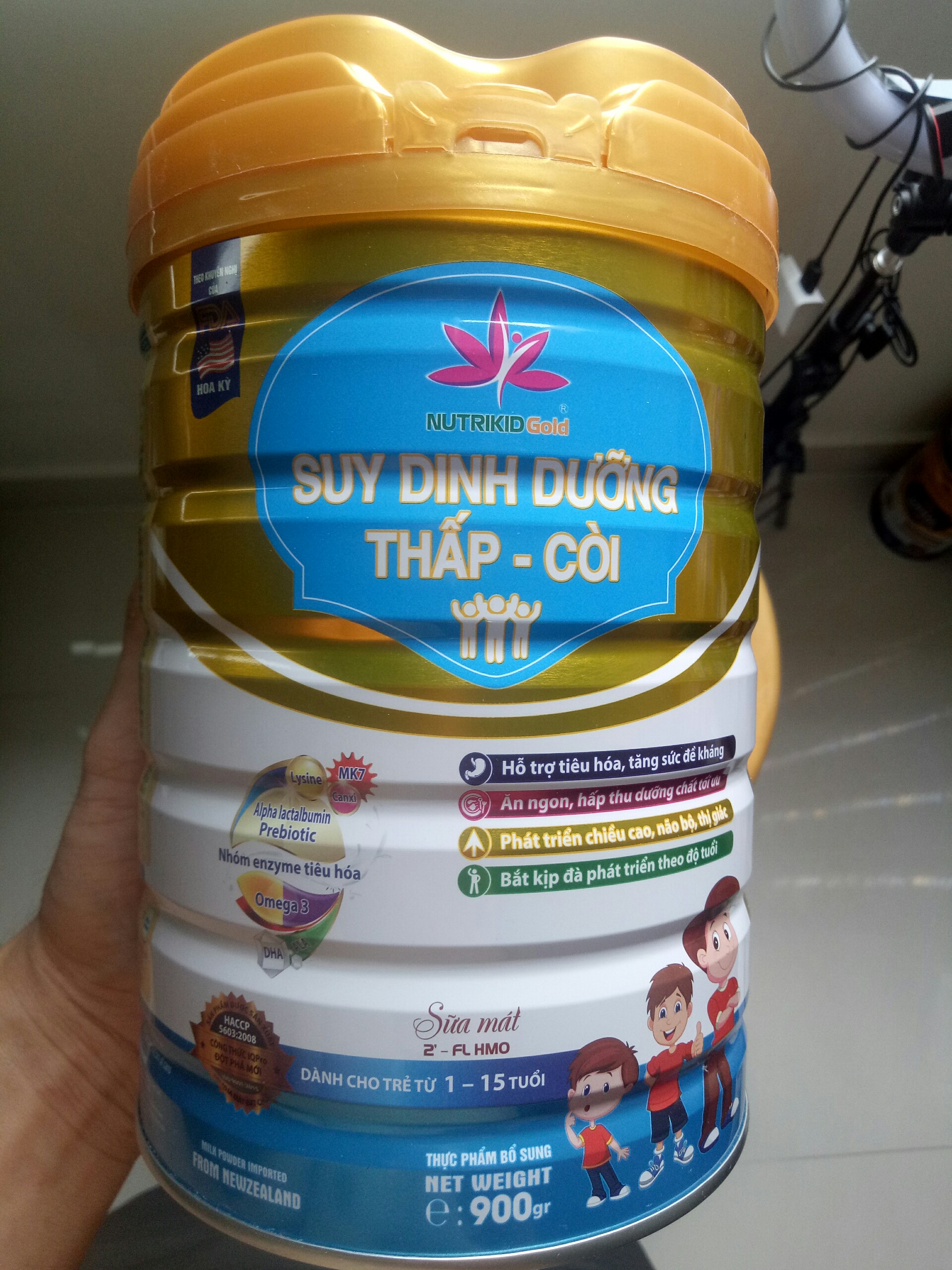 Sữa dành cho trẻ suy dinh dưỡng thấp còi 1-15 tuổi Nutrikidgold lon 900g