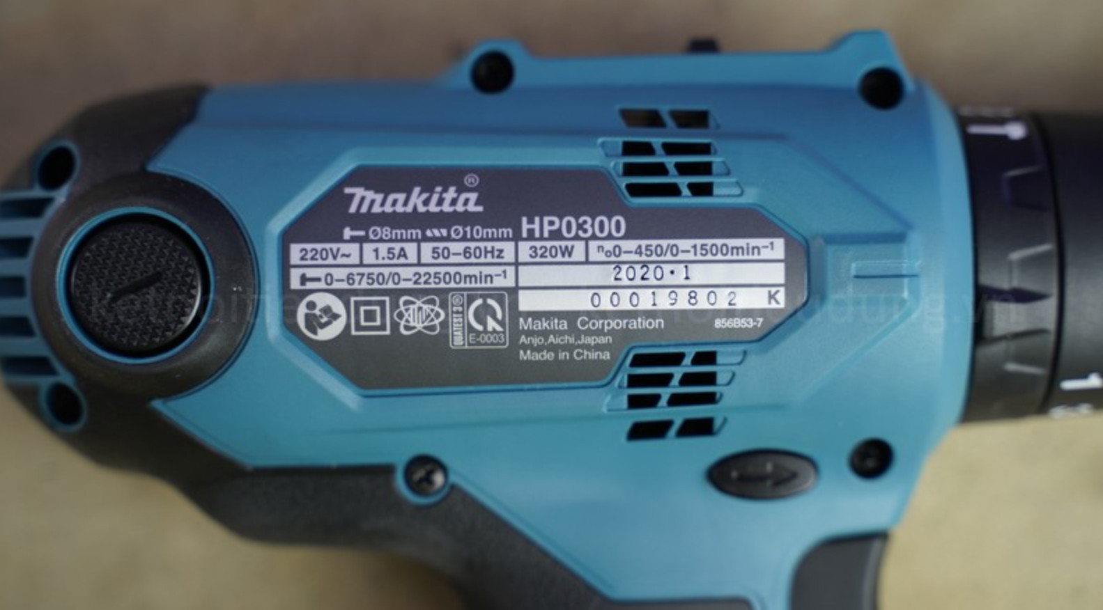 Máy khoan búa và vặn vít Makita (10mm) HP0300