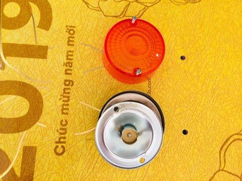1 tai + 1 chụp xinhan trước xe cub -86