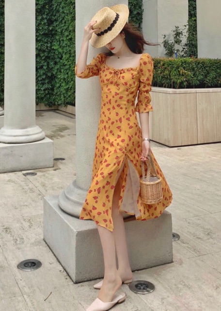Đầm hoa vàng xẻ tà form dài