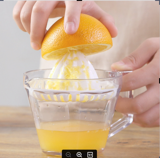 Dụng cụ vắt cam trong suốt