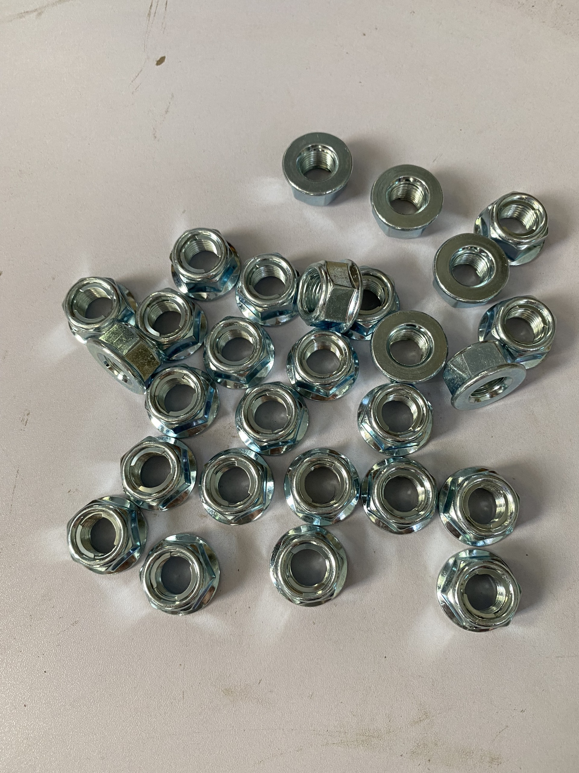 Ốc trục trước + sau 12mm zin