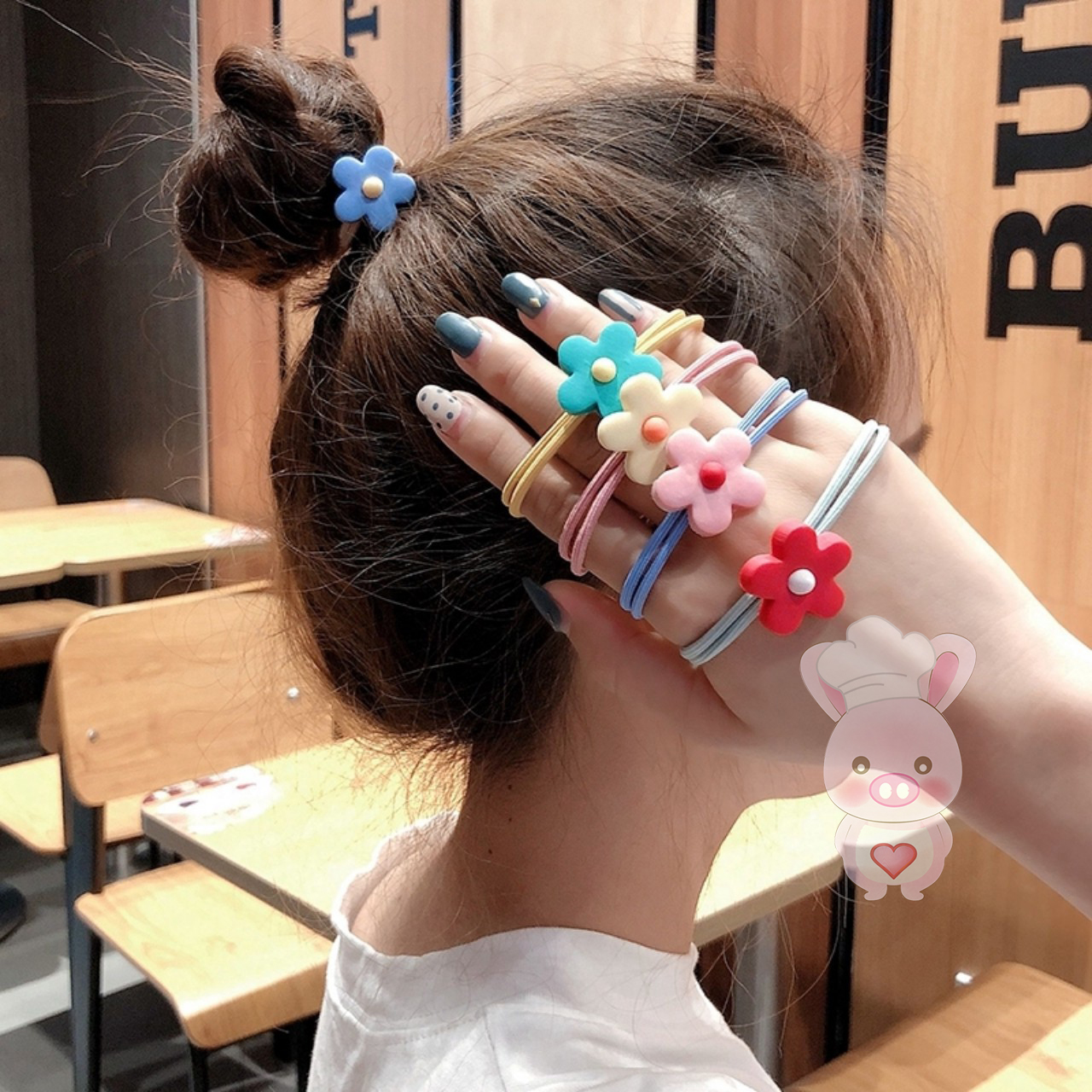 Cột tóc hình hoa mai cute cho bạn và bé