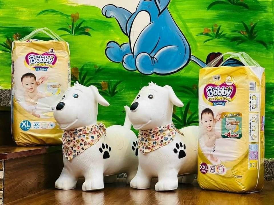 (tặng kèm bơm tay) Thú nhún Cún con Toys đen khăn yếm