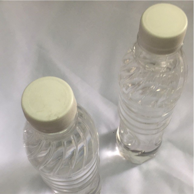 Dầu máy khâu ( 2 chai loại 0,5lít ) , kèm 1 vịt dầu bé