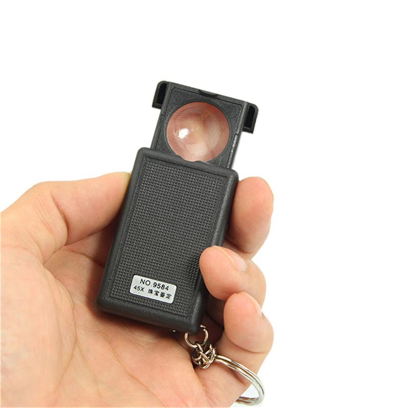[HCM]Móc khóa kính lúp có đèn Led chiếu sáng