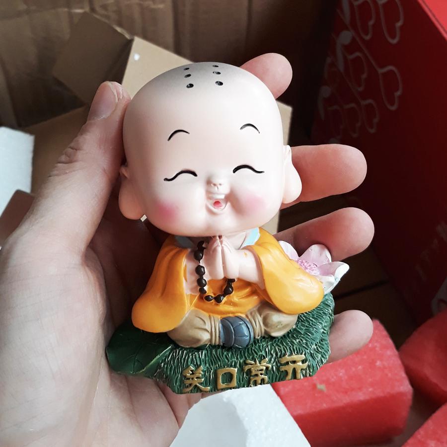 Tượng chibi chú tiểu tươi cười