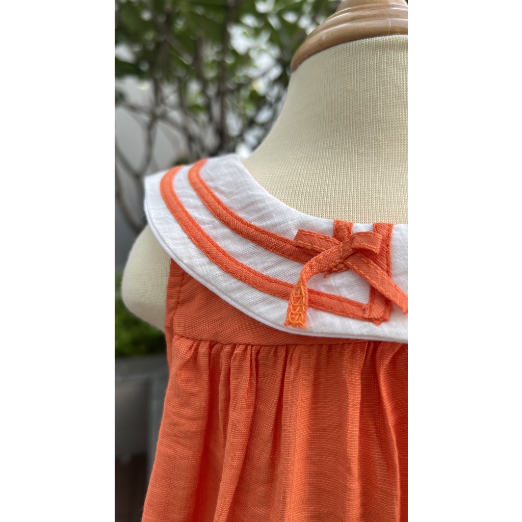 Đầm xoè cổ tròn đính nơ cho bé gái