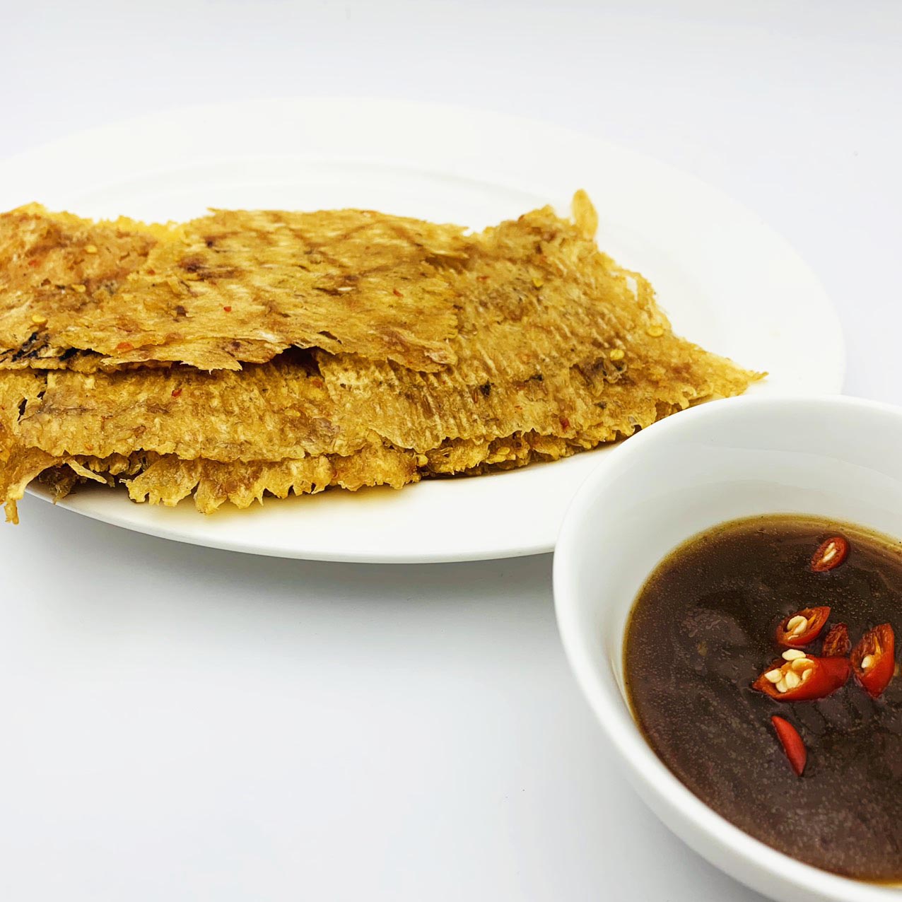Mực Cán Chấm Sốt Me - tui 80-100gr