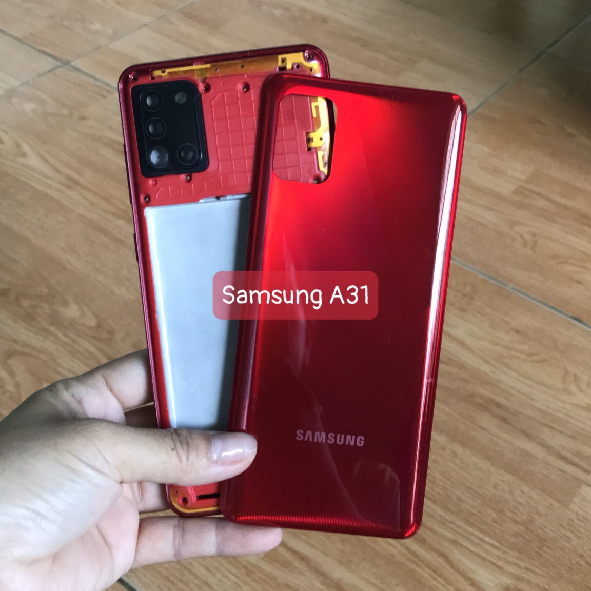 Bộ vỏ samsung A31 zin (bộ gồm lưng,sườn, nút bấm, kính camera)
