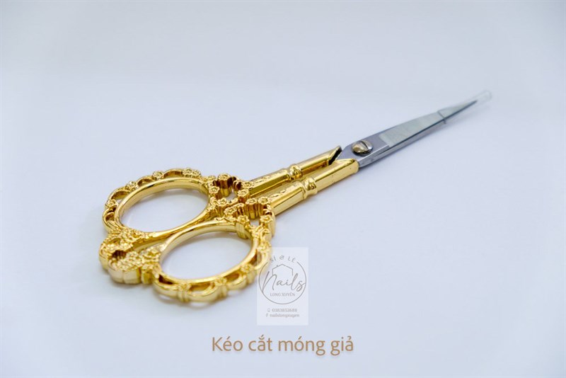 KÉO hoàng cung cắt móng giả