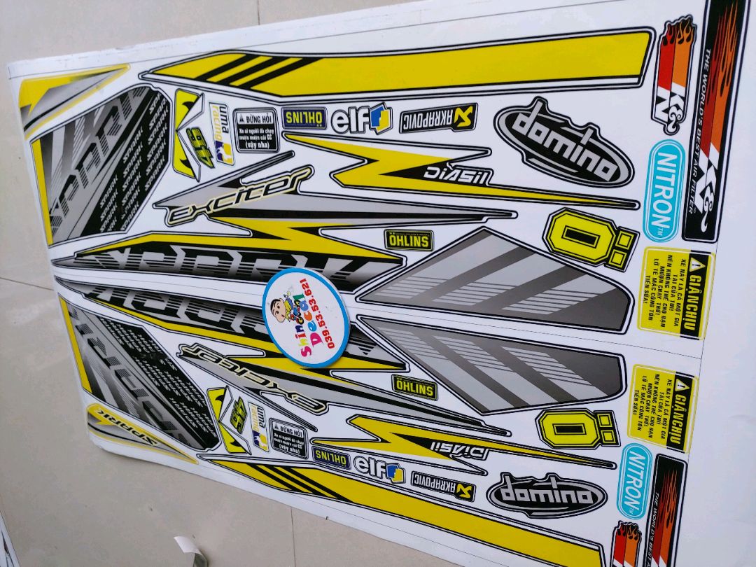 Tem exciter 2010 spark vàng đen