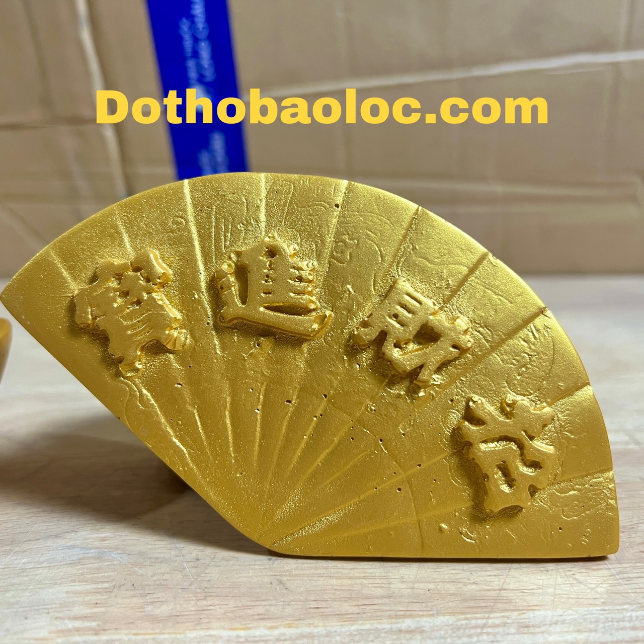 Thỏi vàng, quạt tượng di lặc bằng bột đá