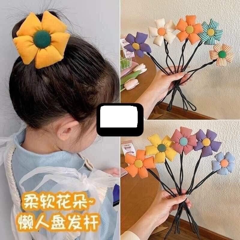 Thanh uốn, búi tóc hình hoa dễ thương cho bé