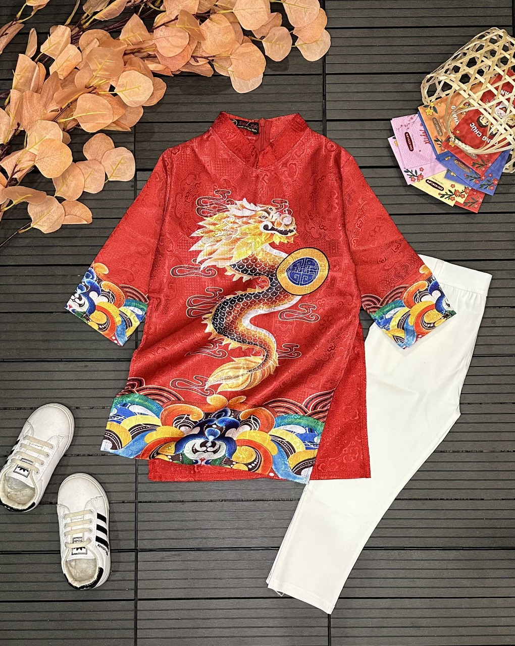 áo dài cách tân bé trai Chất liệu vải gấm.