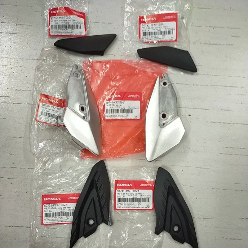 A Bộ gác chân xếp sau Honda PCX 2017-2020
