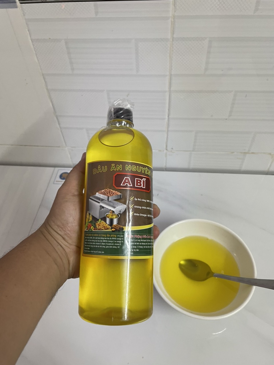 Dầu đậu phộng ép lạnh A Bí (1lít)