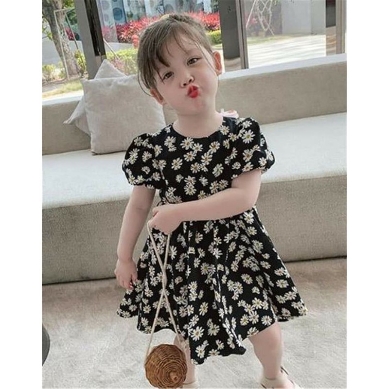 Đầm thô hoa cúc cho bé gái