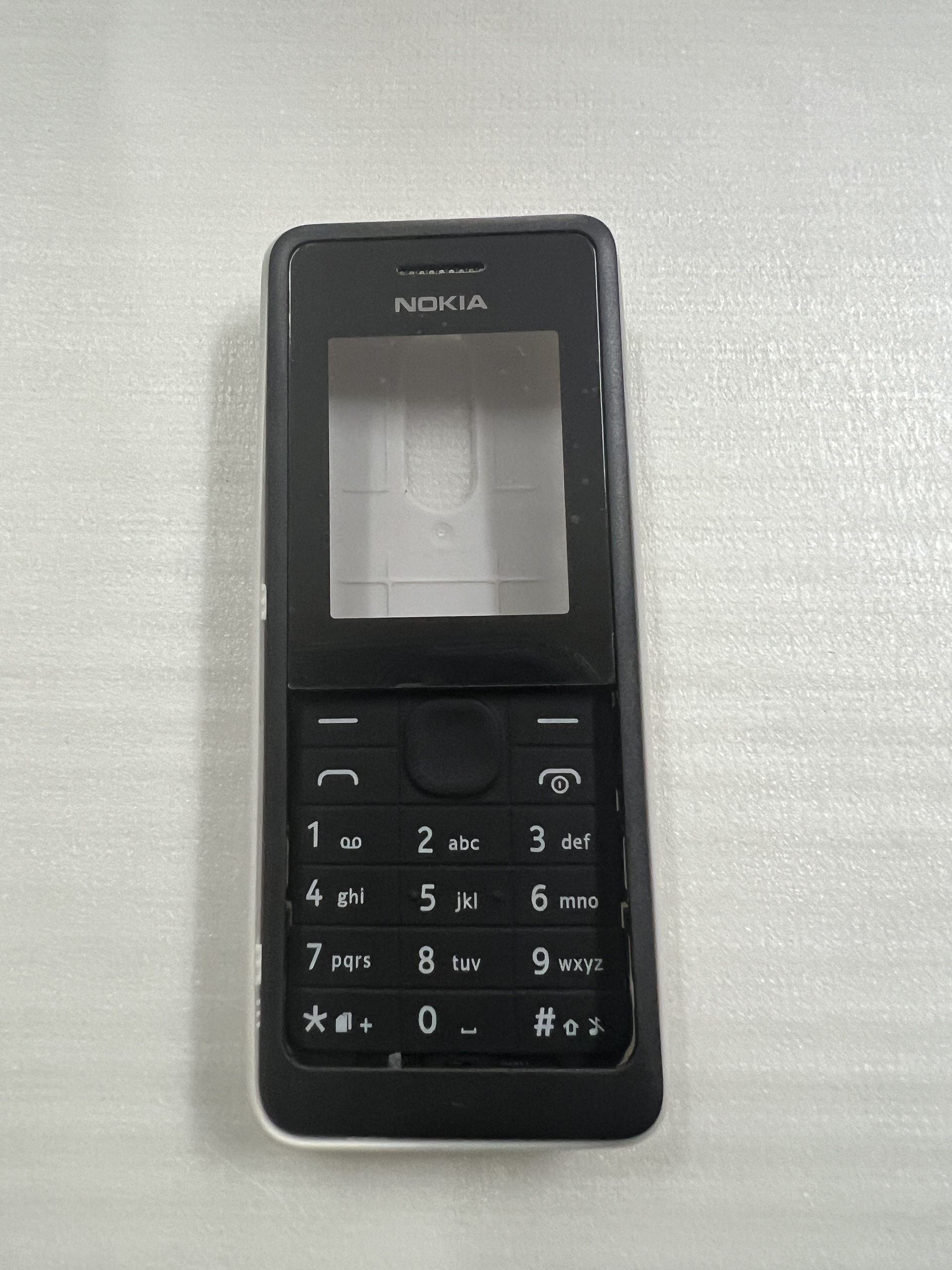Vỏ Nokia 107 /106 ( không sườn - có phím )