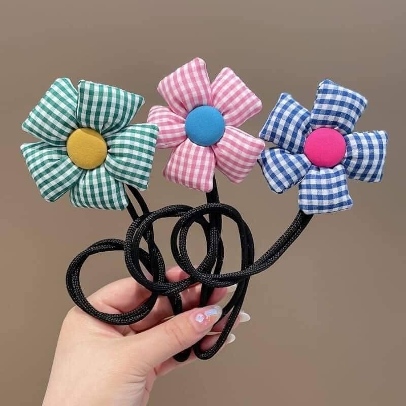 Thanh uốn, búi tóc hình hoa dễ thương cho bé