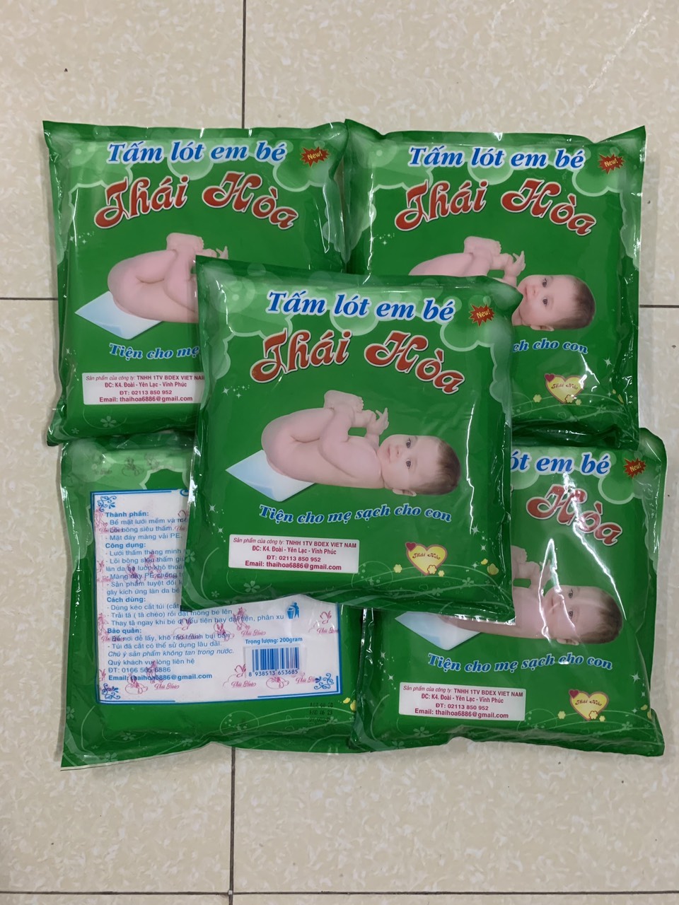 Tấm lót phân su sơ sinh 3 lớp Thái Hòa (200gram - 35 tờ)
