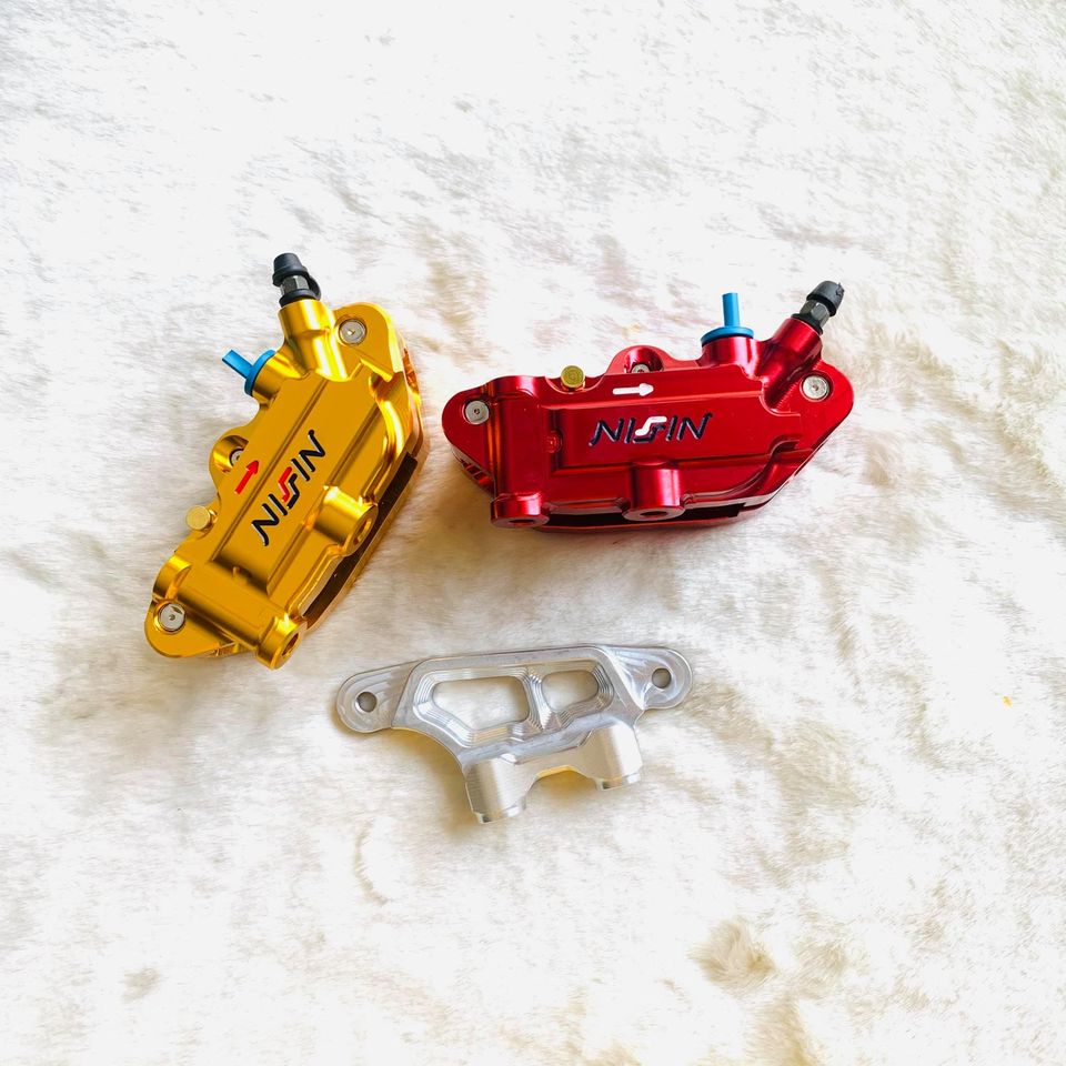 Pát trước Vario đi đĩa 260 xài heo 4 piston đối xứng Nissin lỗ trụ 6 và 8mm