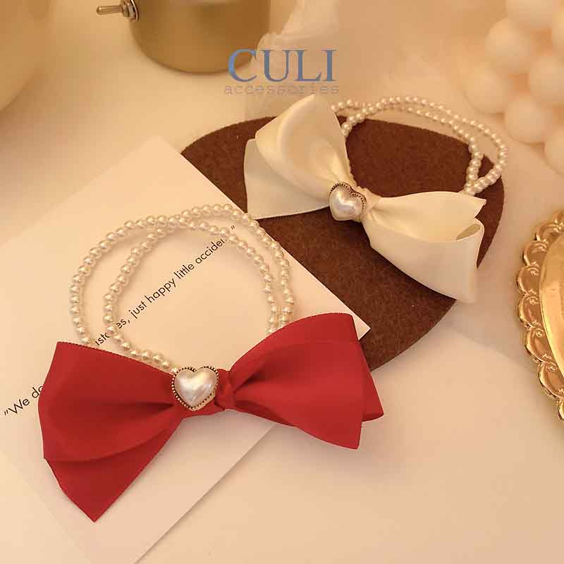 Cột tóc nơ dây ngọc trai xinh xắn