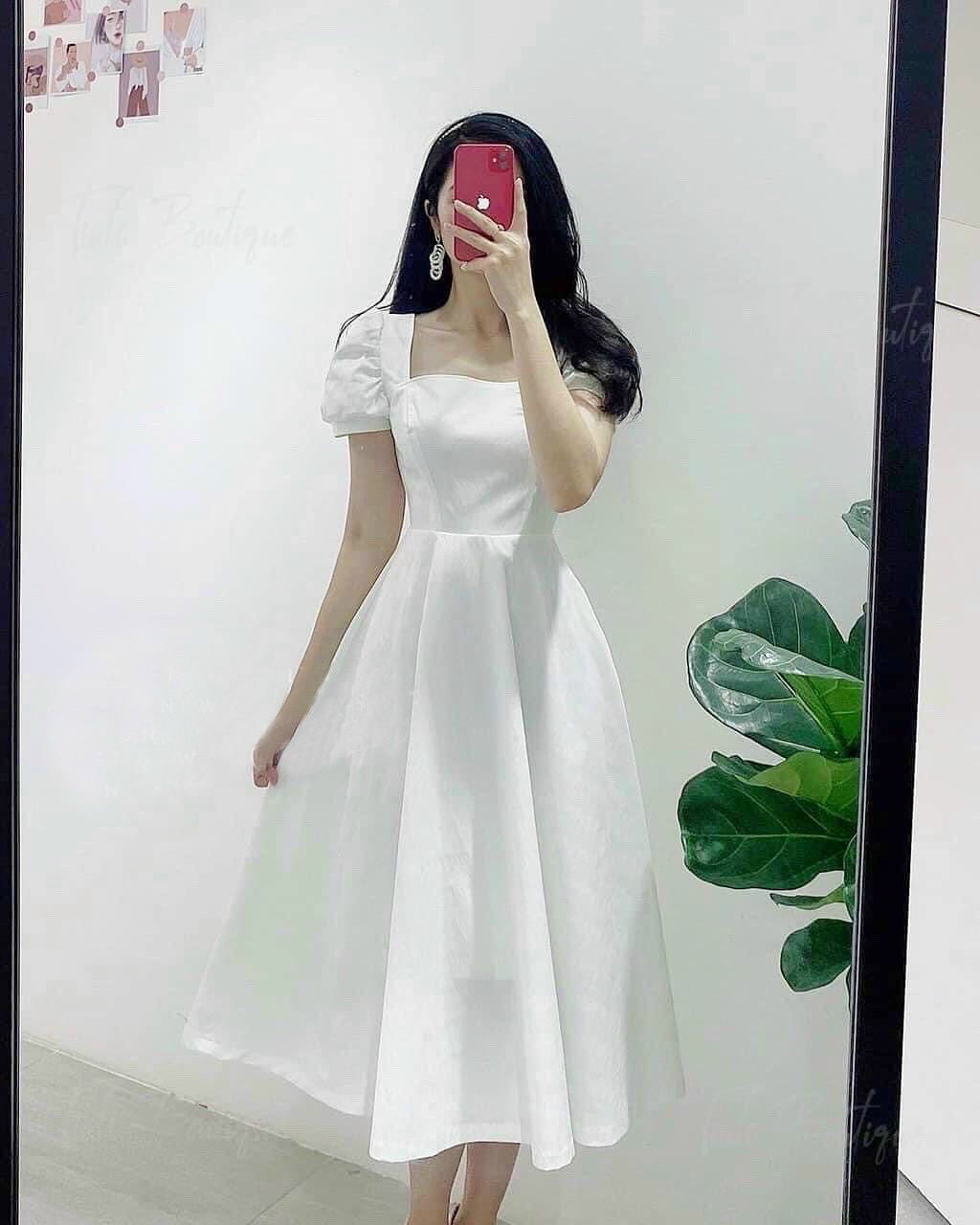 Đầm trắng cổ vuông nơ sau