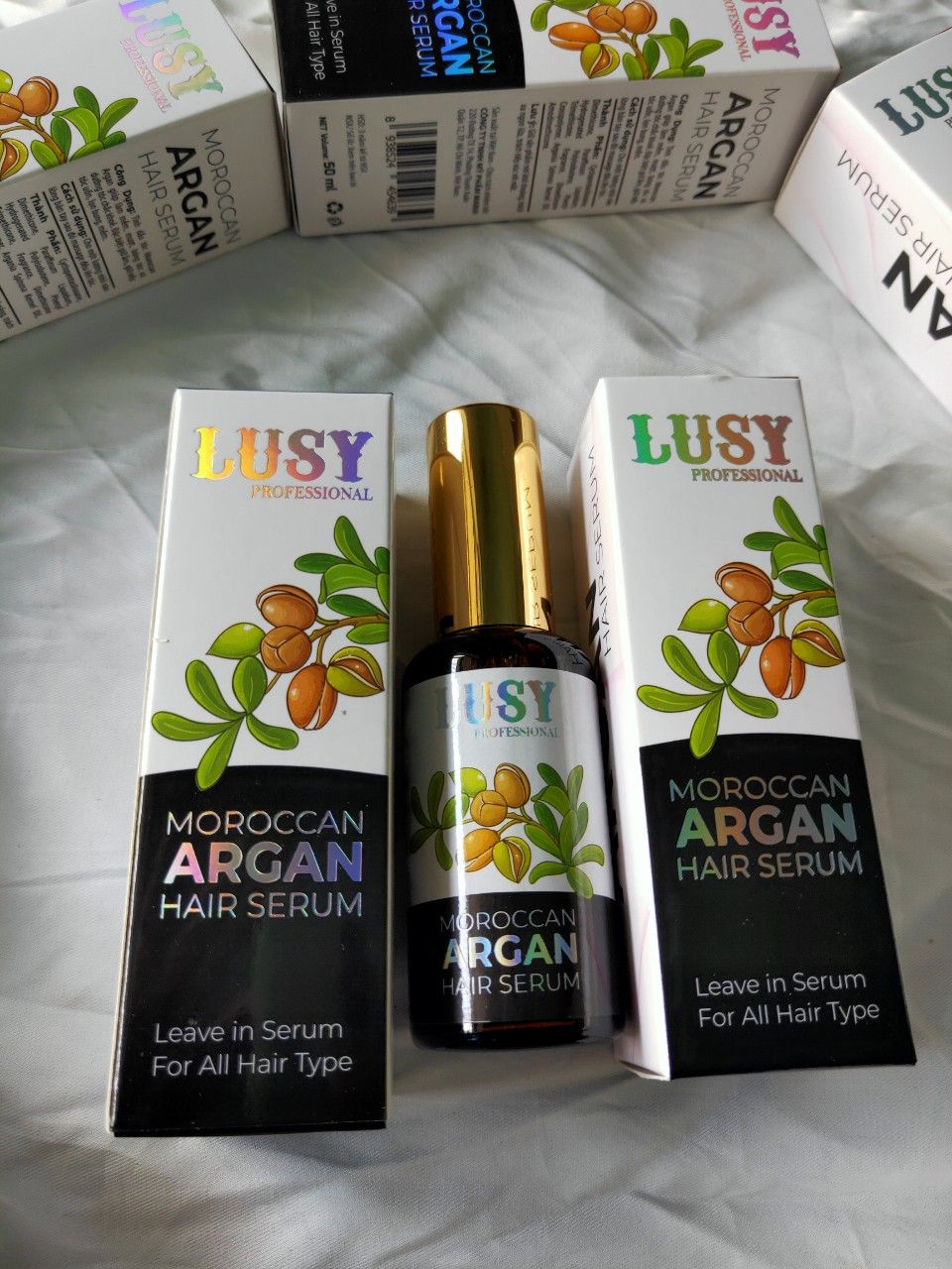 Tinh dầu dưỡng tóc bóng mượt Lusy