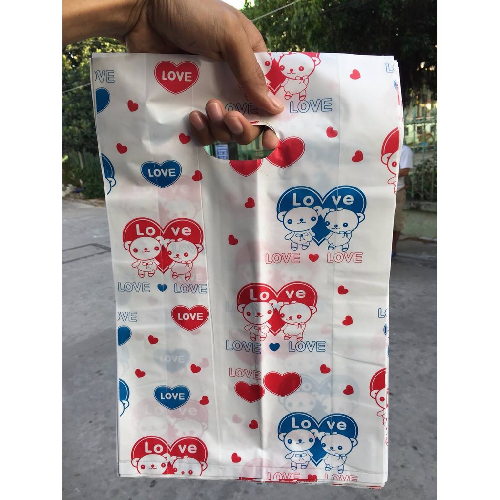 1kg túi xốp in hình ( túi hột xoài )