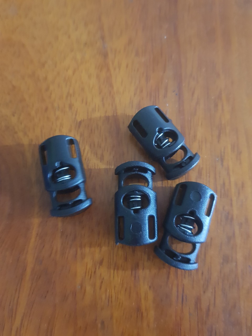 NÚT CHẶN QUAI NÓN , MÓC TREO