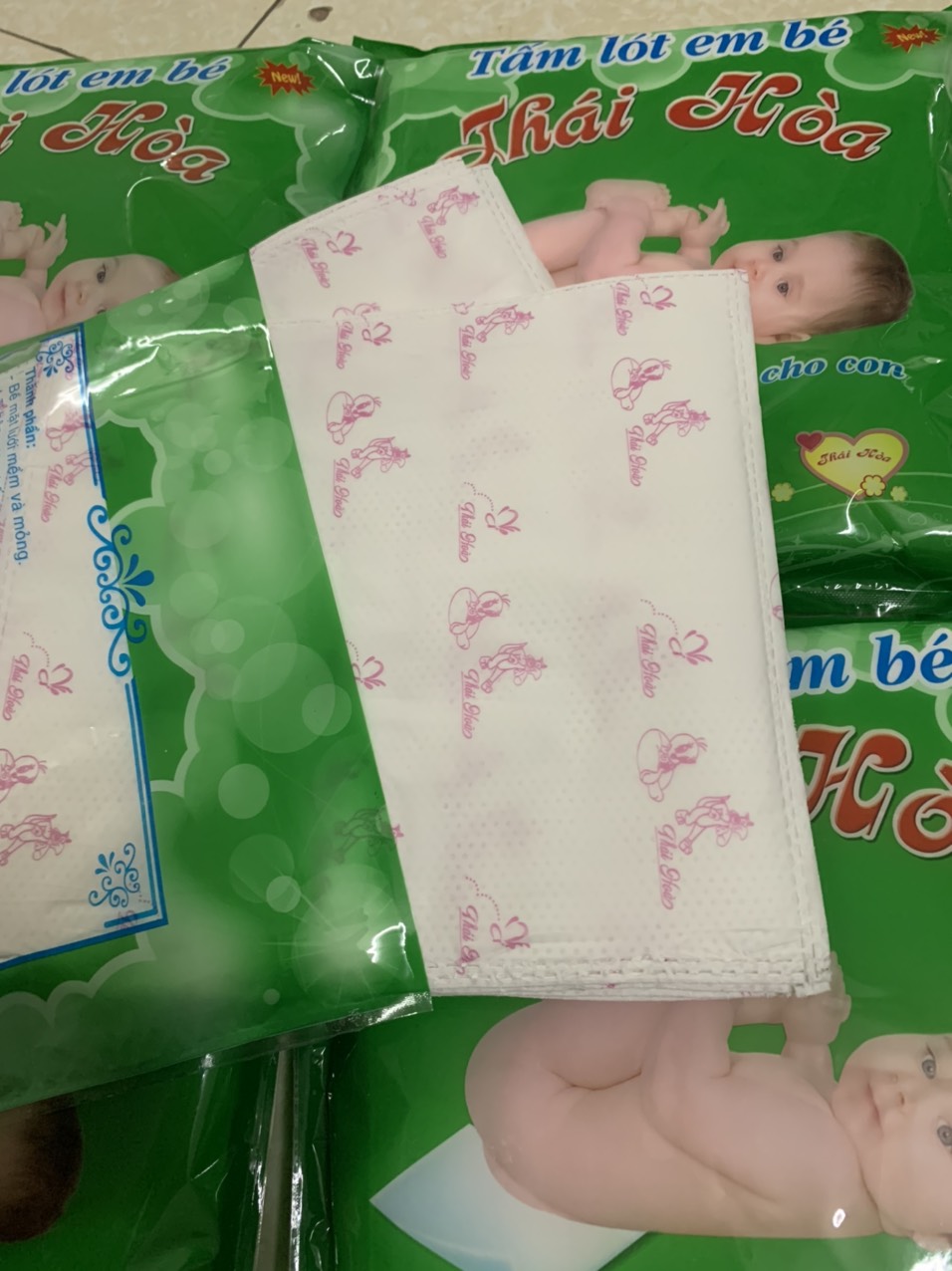 Tấm lót phân su sơ sinh 3 lớp Thái Hòa (200gram - 35 tờ)