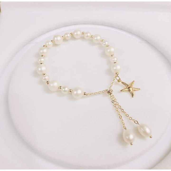 Vòng tay hạt ngọc trai 8ly mix charm sao biển - ngọc trai trường thịnh