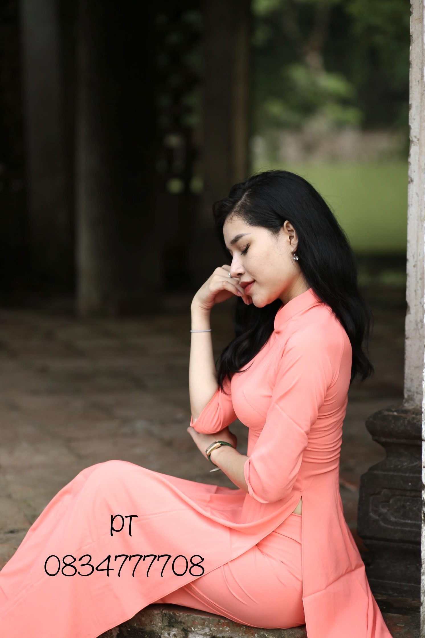 Áo dài trơn màu xanh ngọc cổ tròn