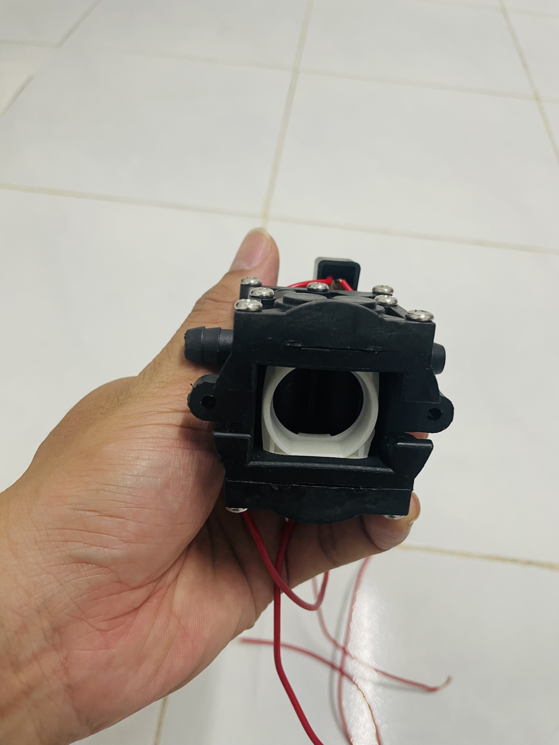 Đầu bơm dùng cho máy bơm mini rửa xe, phun sương