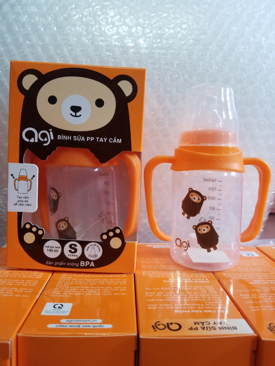 Bình sữa PP tay cầm AGI thể tích 140ml thích hợp cho bé 0 đến 3 tháng